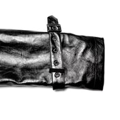 PVC polyester coat jacket trench trenchcoat jersey-knit fabric front zip zipper zippers studded studs shoulders buckle cuffs costume matrix cyberpunk futuristic goth gothic fashion bold glossy long-sleeve longsleeve long sleeve sleeved high-stand collar knee-length black