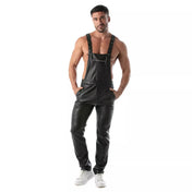 Black wetlook overall pants, fitted faux leather dungarees with adjustable straps, zippered chest pocket, and snap-button fly.