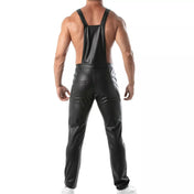 Black wetlook overall pants, fitted faux leather dungarees with adjustable straps, zippered chest pocket, and snap-button fly.