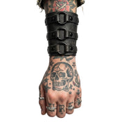 Leather coach-leather genuine-leather accessories arm-gear bracelet bracer gauntlet-style gauntlet short-gauntlet O-ring 3-ring three-ring wrist-cuff snap-button press-stud secure comfortable soft dark strong durable fetish fetishwear fashion alt-fashion alternative punk rock goth gothic cyber cyberpunk clubwear festival concert everyday bondage bdsm bdsm-fashion costume cosplay halloween unisex black
