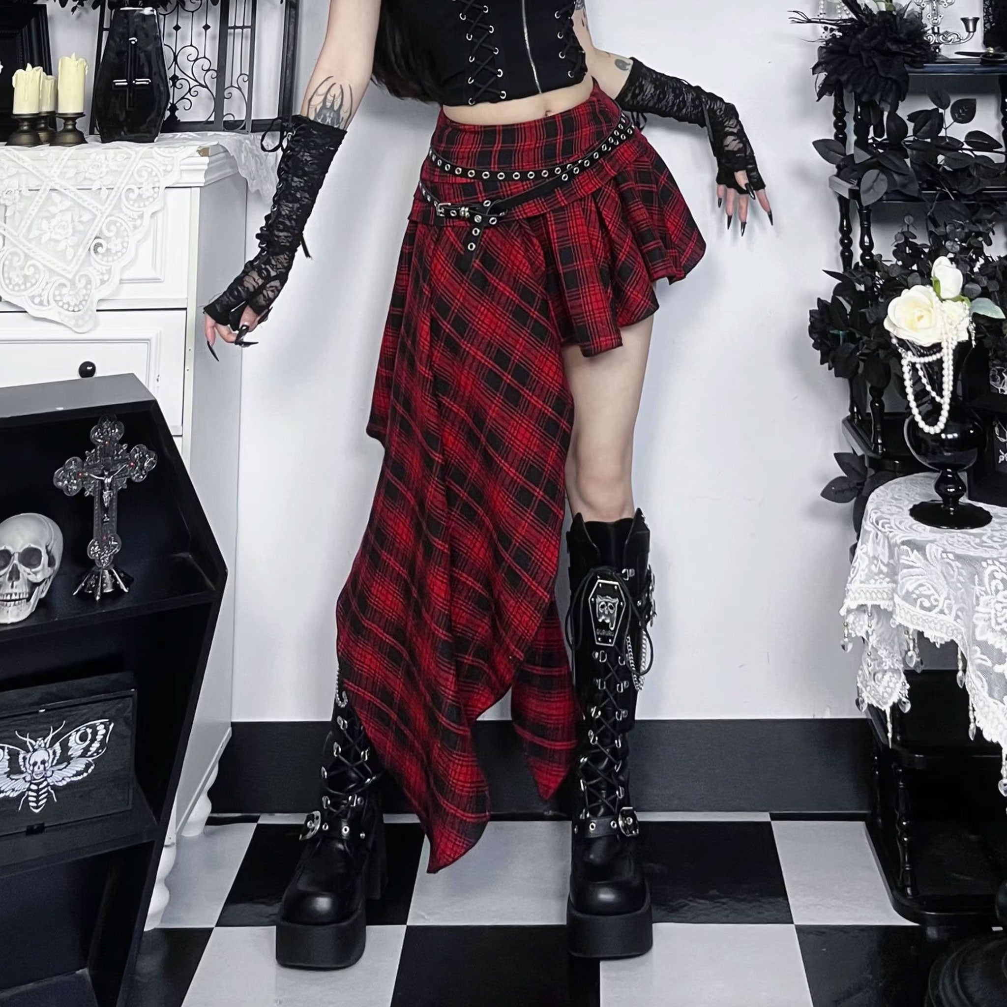 Polyester cotton leather vegan-leather apparel skirt midi-skirt mini-skirt asymmetrical bodycon zipper waistband-zip leather-belt adjustable buckle stylish trendy edgy unique stretchy comfortable fashion alt-fashion alternative punk goth gothic casual festival kink kinky kinkwear roleplay role-play uniform schoolgirl back-to-school back-2-school costume cosplay halloween female femme feminine womens tartan plaid red