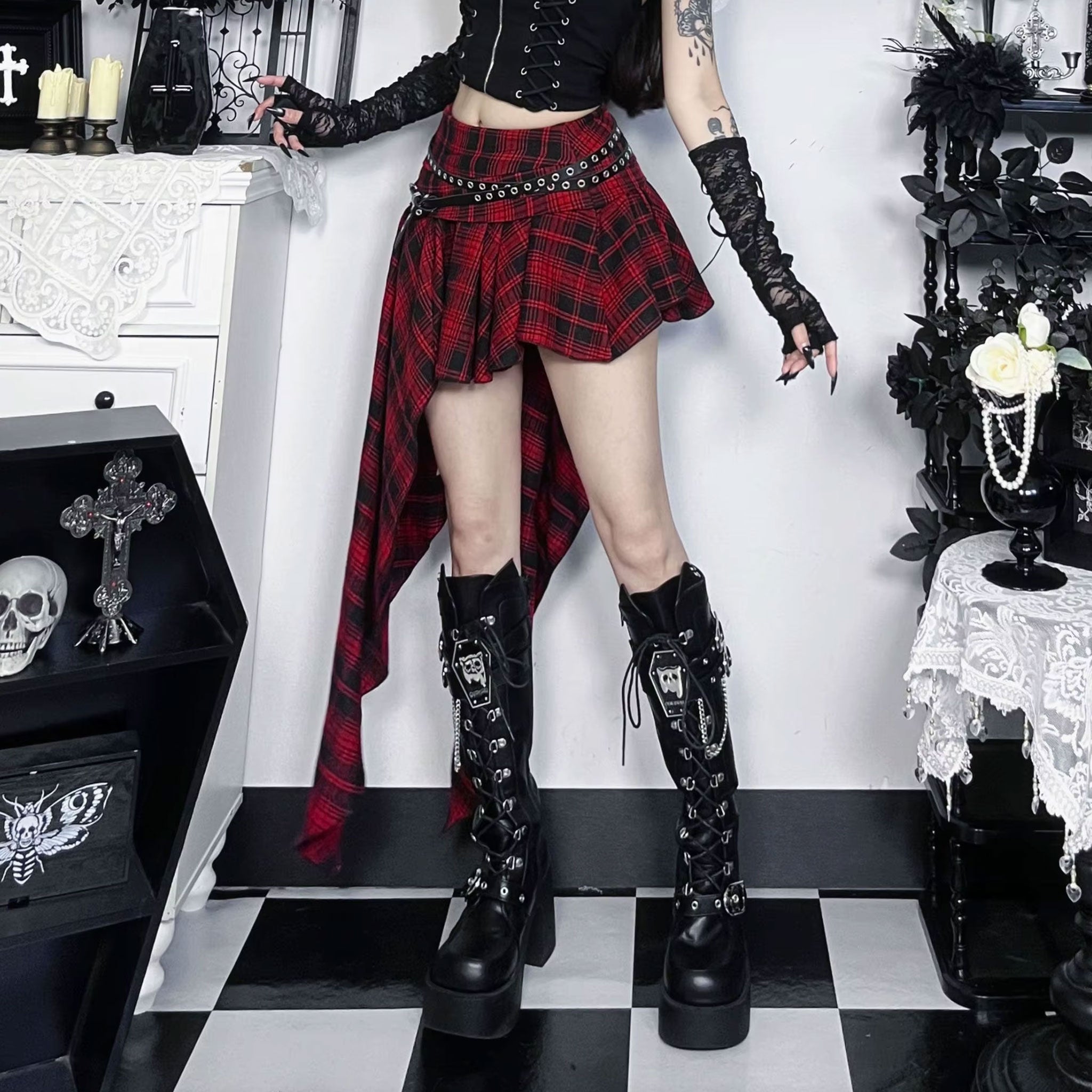 Polyester cotton leather vegan-leather apparel skirt midi-skirt mini-skirt asymmetrical bodycon zipper waistband-zip leather-belt adjustable buckle stylish trendy edgy unique stretchy comfortable fashion alt-fashion alternative punk goth gothic casual festival kink kinky kinkwear roleplay role-play uniform schoolgirl back-to-school back-2-school costume cosplay halloween female femme feminine womens tartan plaid red