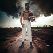 White bear bondage boy with harness, decorative 21-inch figure.