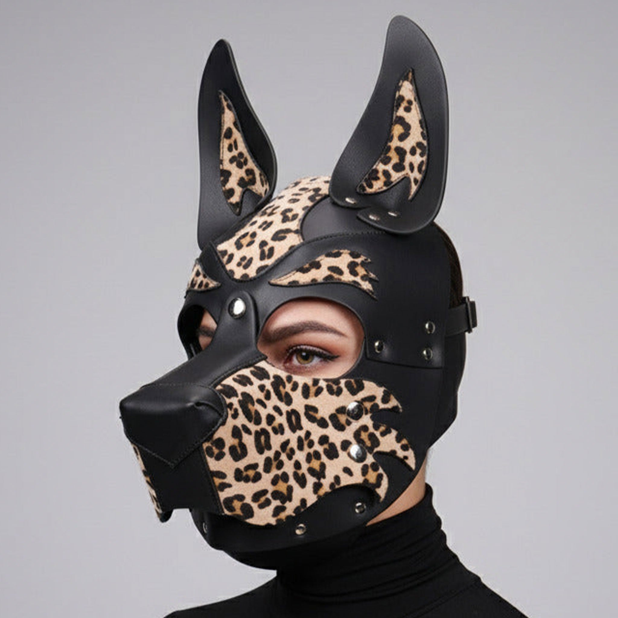 Leather faux-leather vegan-leather accessories mask dog-mask open-back standing-ears snout muzzle snap-button press-stud adjustable buckle back-strap crown-strap animal animalistic wild customizable bold eye-catching edgy playful bondage bdsm bdsm-toys bdsm-play kink kinky kinky-play pet pet-play animal pup pup-play puppy-play roleplay role-play costume cosplay halloween adult-toys unisex animal-print leopard-print black natural