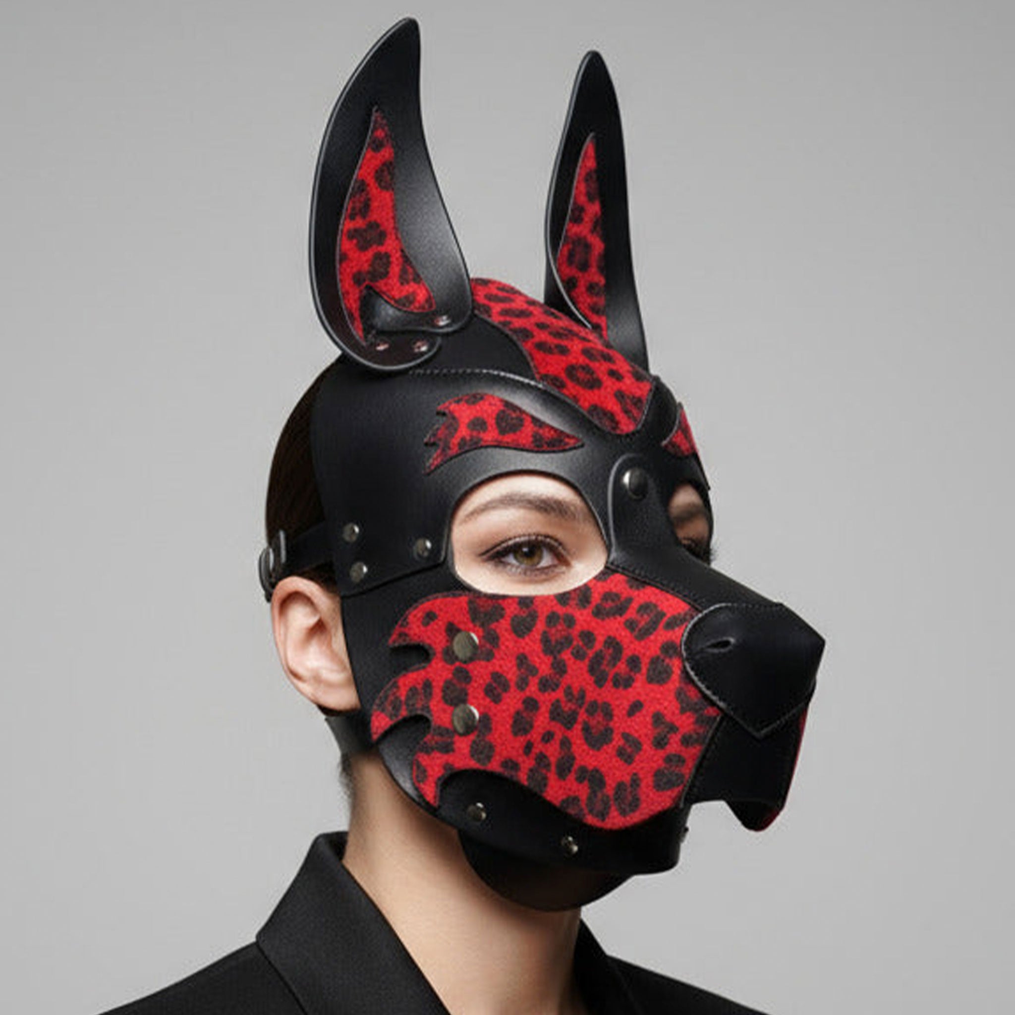 Leather faux-leather vegan-leather accessories mask dog-mask open-back standing-ears snout muzzle snap-button press-stud adjustable buckle back-strap crown-strap animal animalistic wild customizable bold eye-catching edgy playful bondage bdsm bdsm-toys bdsm-play kink kinky kinky-play pet pet-play animal pup pup-play puppy-play roleplay role-play costume cosplay halloween adult-toys unisex animal-print leopard-print black red
