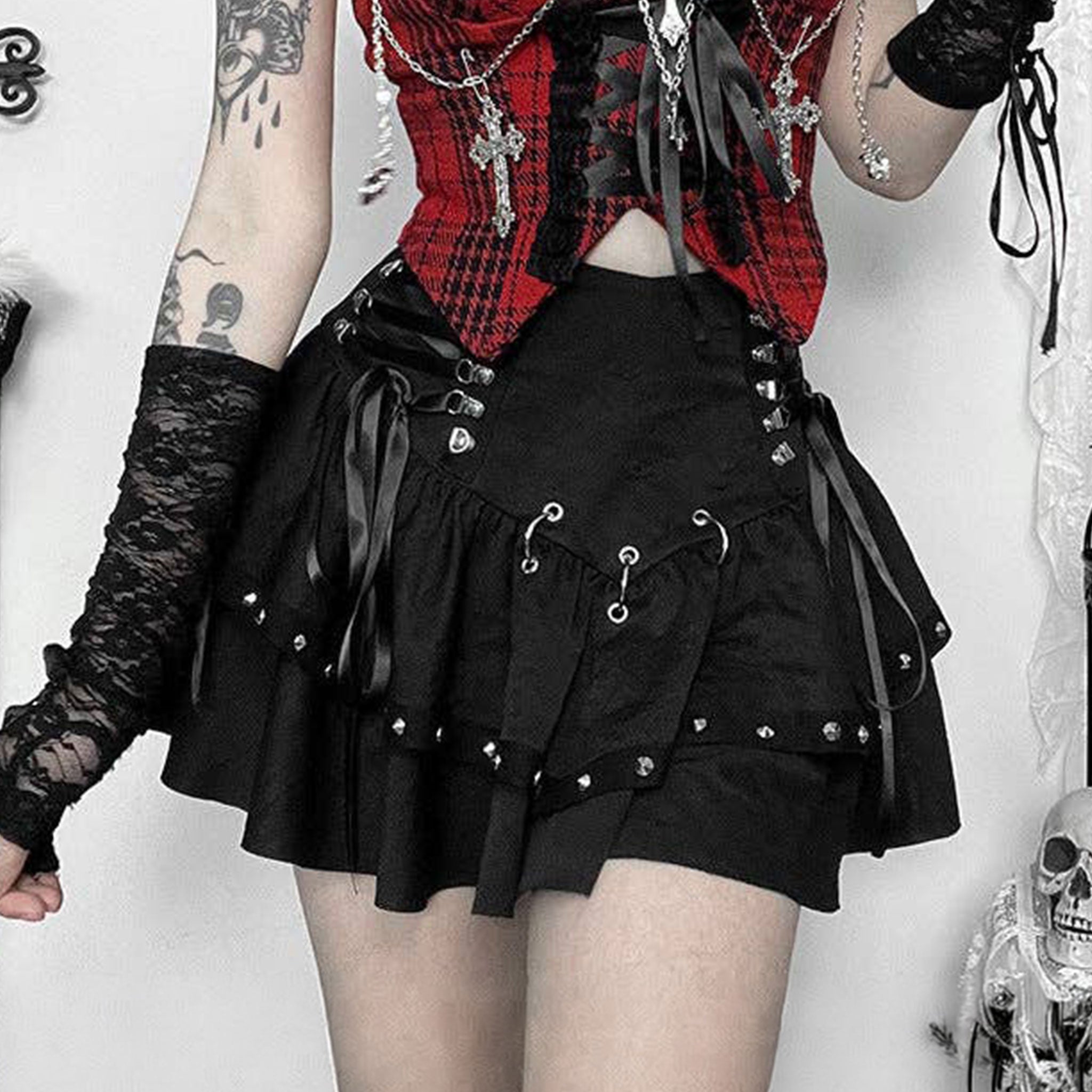 Polyester satin-ribbon apparel bottoms skirt mini-skirt short-skirt tennis-skirt a-line bodycon ruffled-hem high-waist o-ring hinged d-ring lightweight breathable comfortable zipper back-zip hidden-zip adjustable side-cinch stand-out bold sexy chic soft flowing flirty elegant fitted dark whimsical fairytale fashion alt-fashion alternative punk goth gothic goth-doll steampunk grunge emo harajuku e-girl casual spooky streetwear party rave raver-babe costume cosplay halloween female femme feminine womens black
