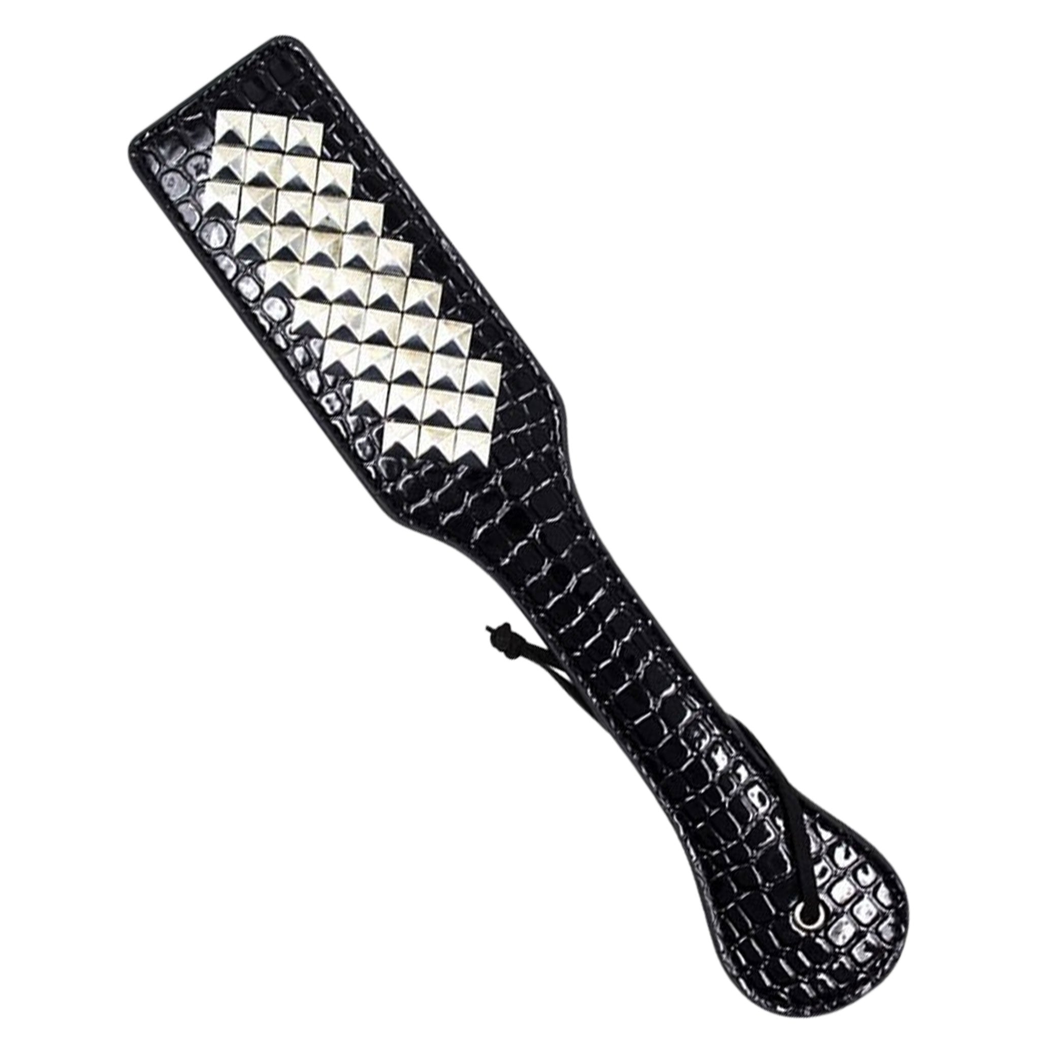 Leather patent-leather textured crocodile-texture accessories bedroom-weapons paddle studs studded pyramid-studs shiny glossy fetish fashion alt-fashion alternative punk goth gothic bedroom dungeon festival bondage bdsm bdsm-toys bdsm-gear kink kinky kinky-play kinky-toys sensory sensory-play spanking punishment pain teasing impact impact-toys impact-play animal croc crocodile adult-toys unisex black