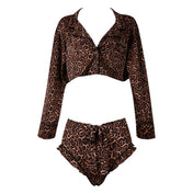 Spandex nylon satin apparel intimates lingerie lingerie-set loungewear 2-piece two-piece 2pc crop-top long-sleeve sleeves sleeved lapels bottoms shorts hipster ruffled ruched front-tie elastic-waistband breathable lightweight stretchy smooth soft luxurious sexy supple playful glossy airy skimpy flowing female femme feminine womens leopard-print 