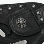 Polyamide twill nylon plastic bag leg-bag compact lightweight versatile ergonomic durable pockets external-pockets multi-functional multifunctional webbing safety-clip pyramid-stud dome-stud round-stud studded rivets zip zipper skull-detail bold unique alt-fashion fashion punk punk-inspired doomsday post-apocalyptic brush-detail costume cosplay halloween unisex black