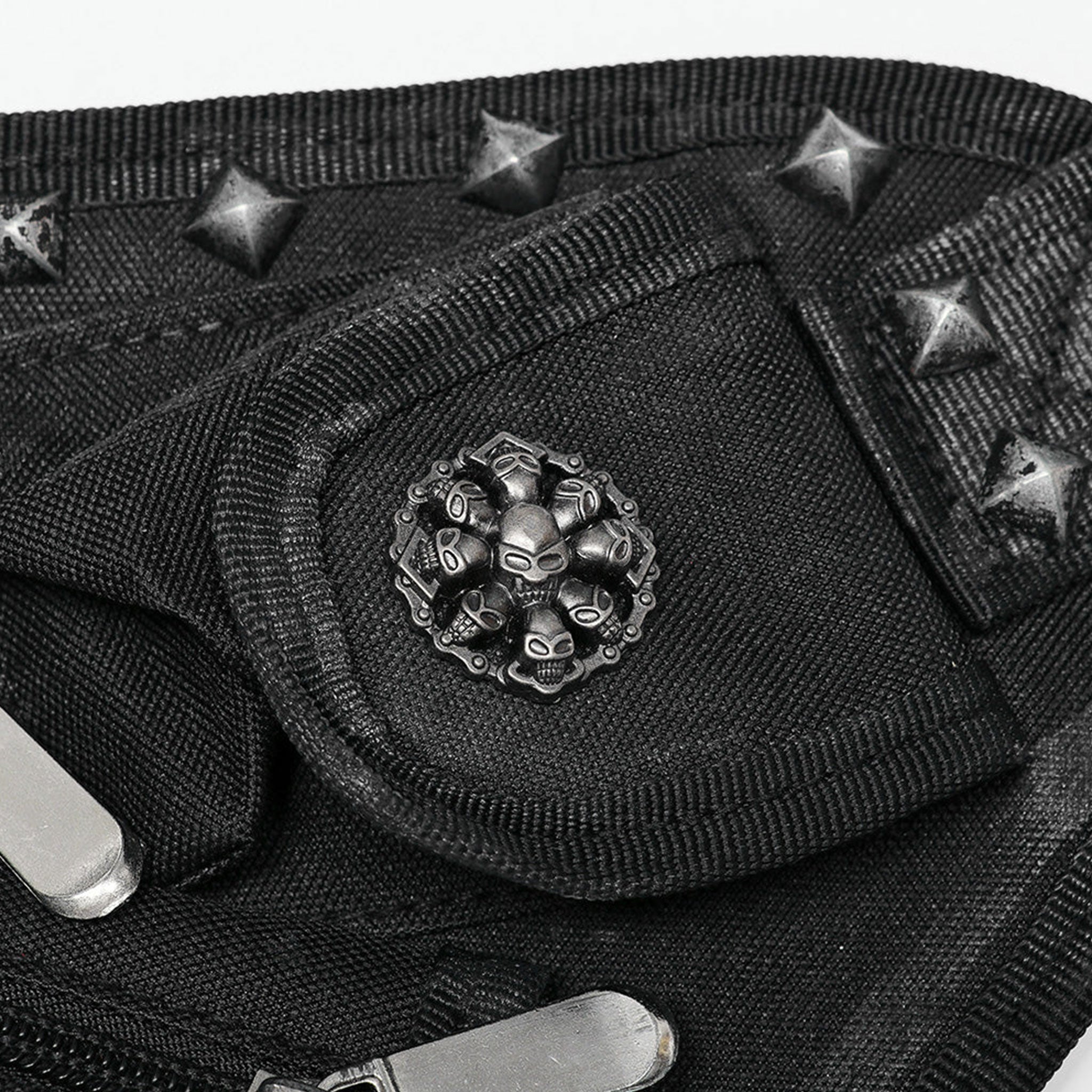 Polyamide twill nylon plastic bag leg-bag compact lightweight versatile ergonomic durable pockets external-pockets multi-functional multifunctional webbing safety-clip pyramid-stud dome-stud round-stud studded rivets zip zipper skull-detail bold unique alt-fashion fashion punk punk-inspired doomsday post-apocalyptic brush-detail costume cosplay halloween unisex black