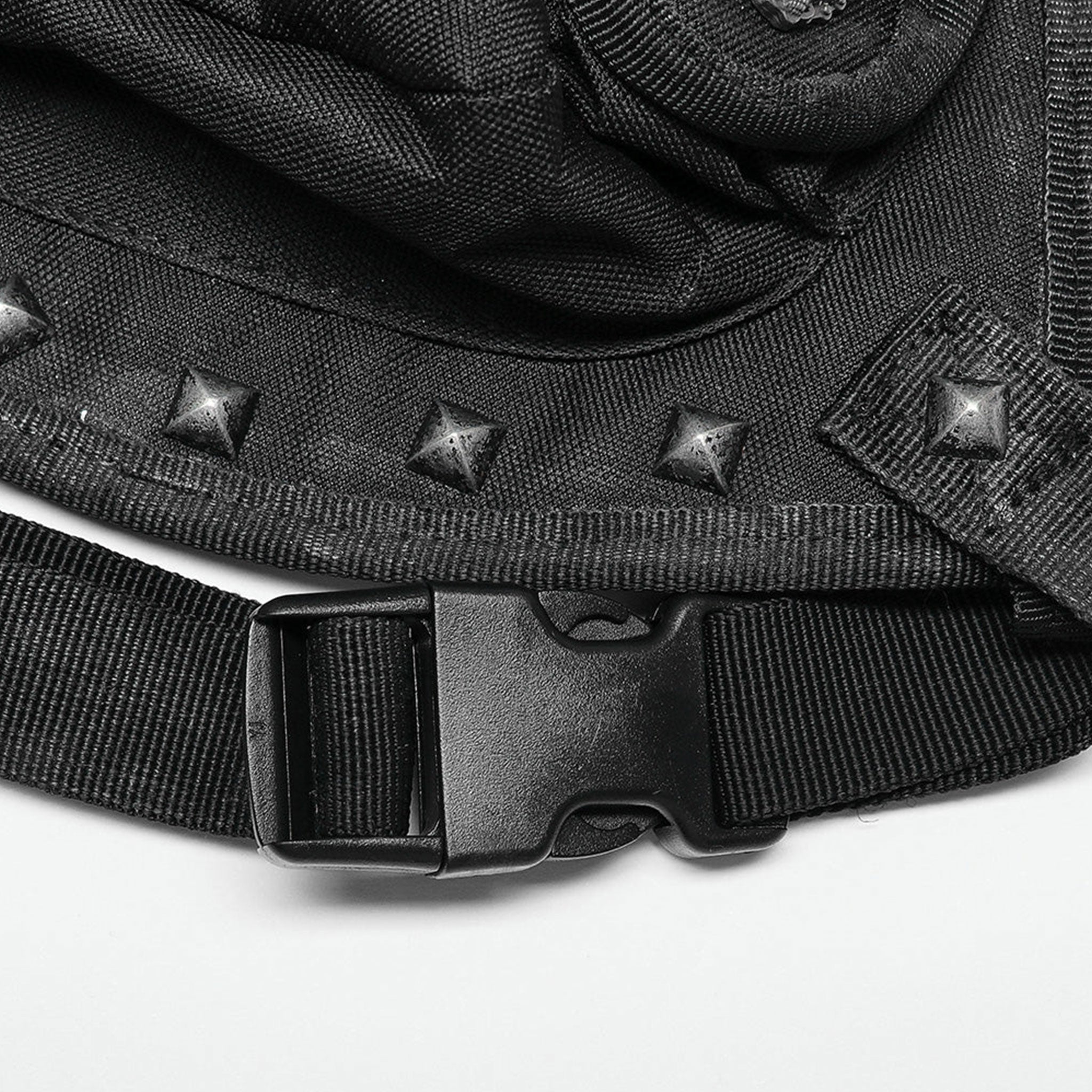 Polyamide twill nylon plastic bag leg-bag compact lightweight versatile ergonomic durable pockets external-pockets multi-functional multifunctional webbing safety-clip pyramid-stud dome-stud round-stud studded rivets zip zipper skull-detail bold unique alt-fashion fashion punk punk-inspired doomsday post-apocalyptic brush-detail costume cosplay halloween unisex black