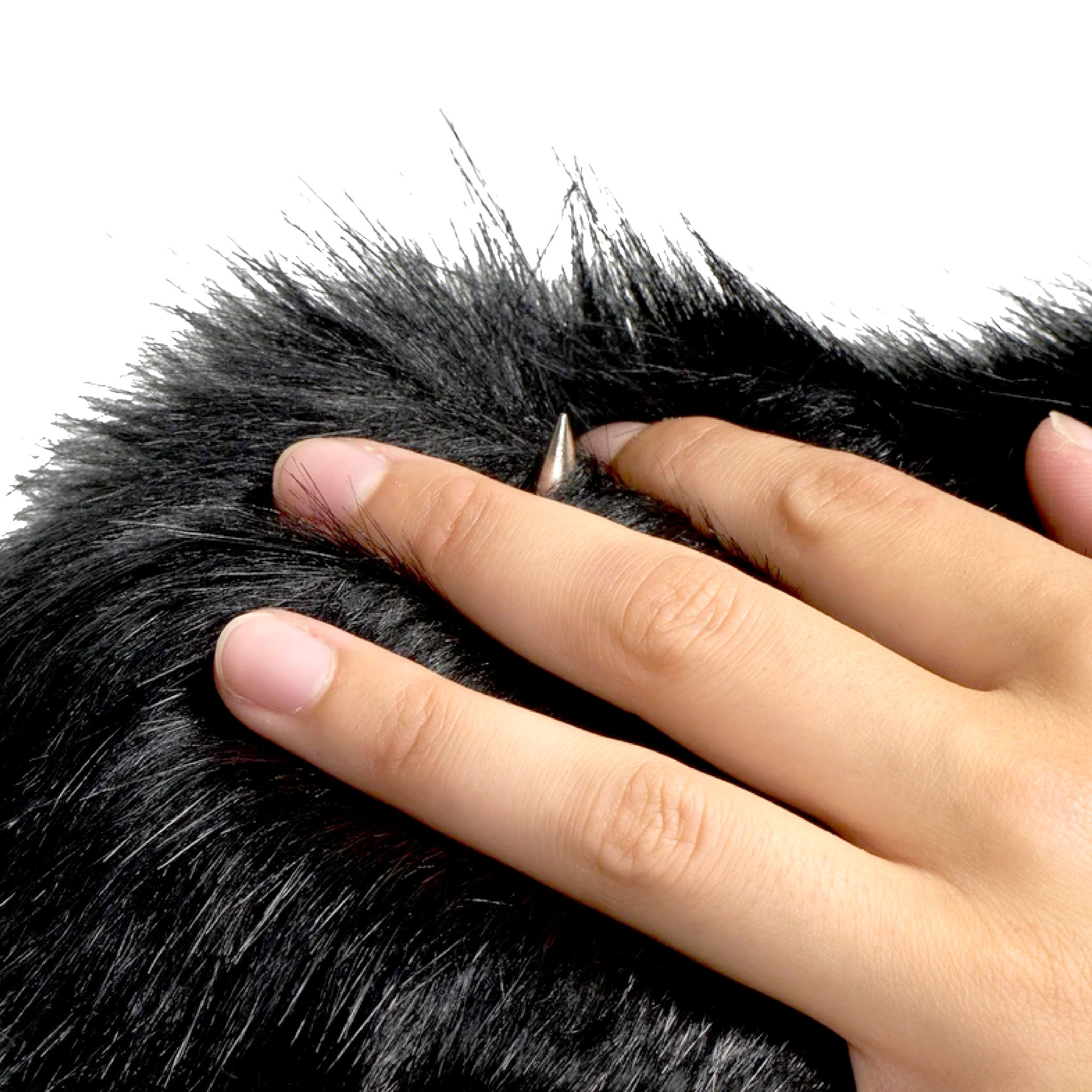 Black spiked faux fur sensory mitt with a dual-sided design, offering a soft faux fur side and a prickly spiked side; ideal for playful couples exploring sensory touch. One size fits all.