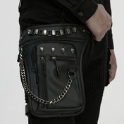 PU polyurethane nylon-webbing accessories bag fanny-pack thigh-bag thigh-holster variable versatile pockets pouches pouch compartments roomy safety-buckle adjustable chain-zip zipper zipper-compartments pull-tabs textured thigh-strap skull skeleton skeletal skull-accent fetish fashion alt-fashion punk edgy attitude practical bold rebellious dark style stylish urban striking costume cosplay halloween unisex black