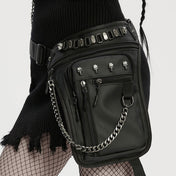 PU polyurethane nylon-webbing accessories bag fanny-pack thigh-bag thigh-holster variable versatile pockets pouches pouch compartments roomy safety-buckle adjustable chain-zip zipper zipper-compartments pull-tabs textured thigh-strap skull skeleton skeletal skull-accent fetish fashion alt-fashion punk edgy attitude practical bold rebellious dark style stylish urban striking costume cosplay halloween unisex black