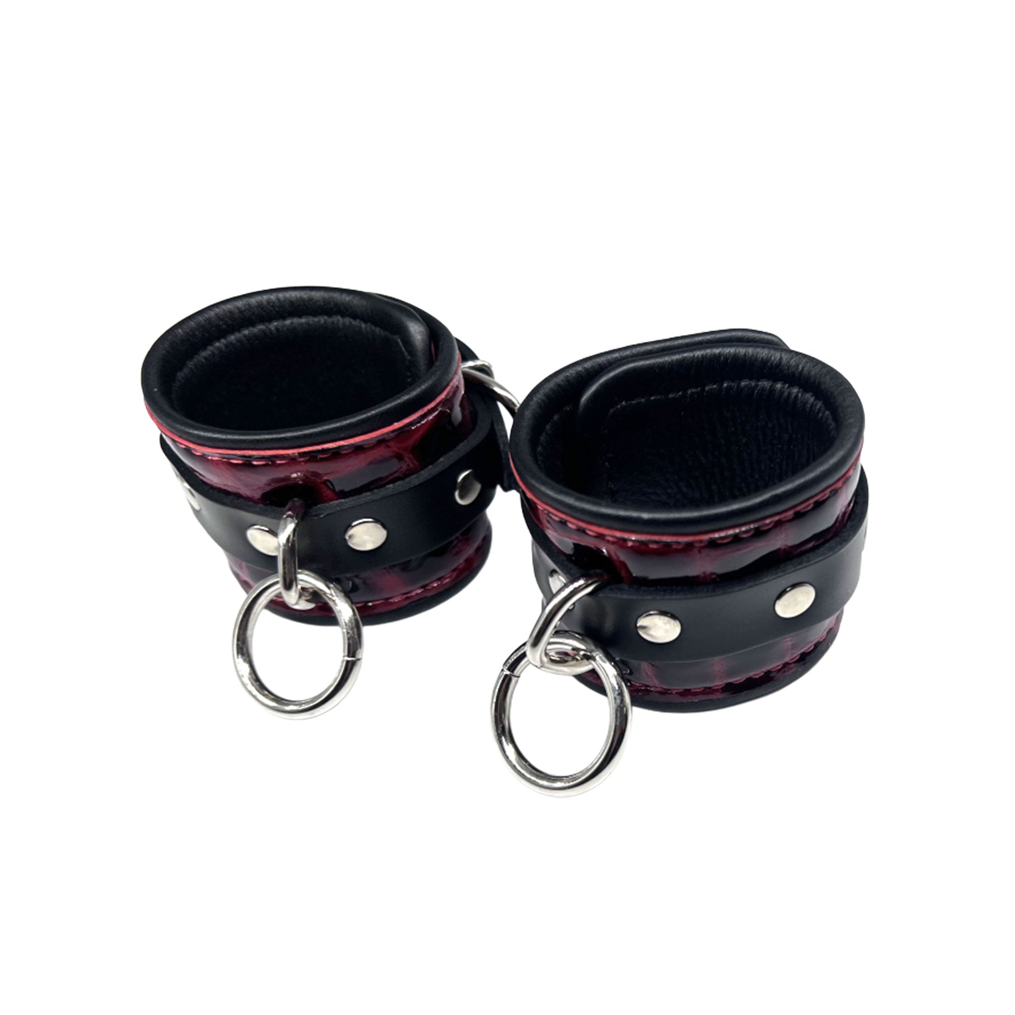 Leather exotic-leather cowhide crocodile croc snake metallic-chrome grommets accessories wrist-cuffs wristcuffs O-ring adjustable buckle D-ring reinforced-eyelets bold adventurous fetish fashion alt-fashion bedroom bondage bdsm bdsm-gear bdsm-toys restraints wrist-restraints sub submissive submission kink kinky kinky-toys kinky-play adult-toys unisex black red