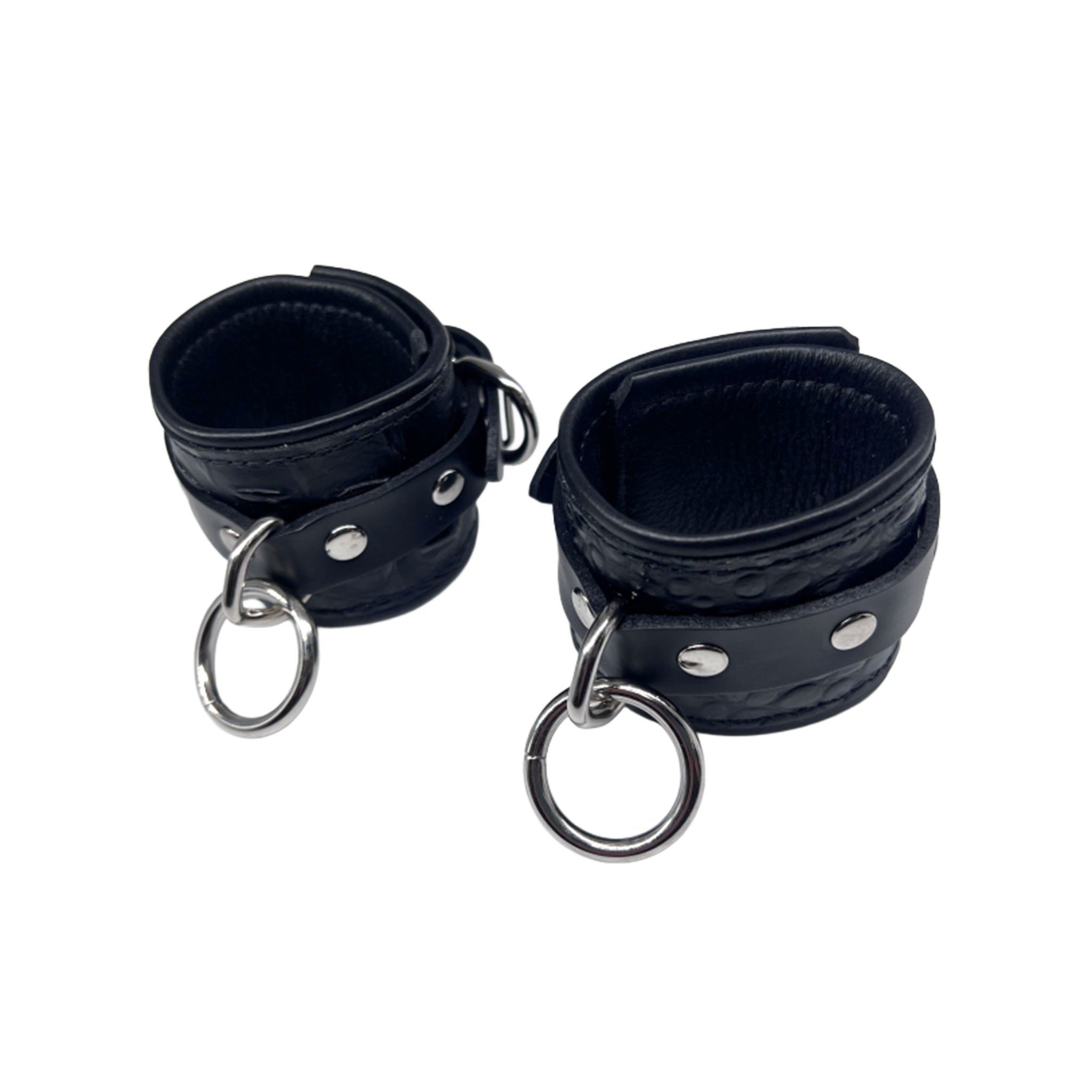 Leather exotic-leather cowhide crocodile croc snake metallic-chrome grommets accessories wrist-cuffs wristcuffs O-ring adjustable buckle D-ring reinforced-eyelets bold adventurous fetish fashion alt-fashion bedroom bondage bdsm bdsm-gear bdsm-toys restraints wrist-restraints sub submissive submission kink kinky kinky-toys kinky-play adult-toys unisex black