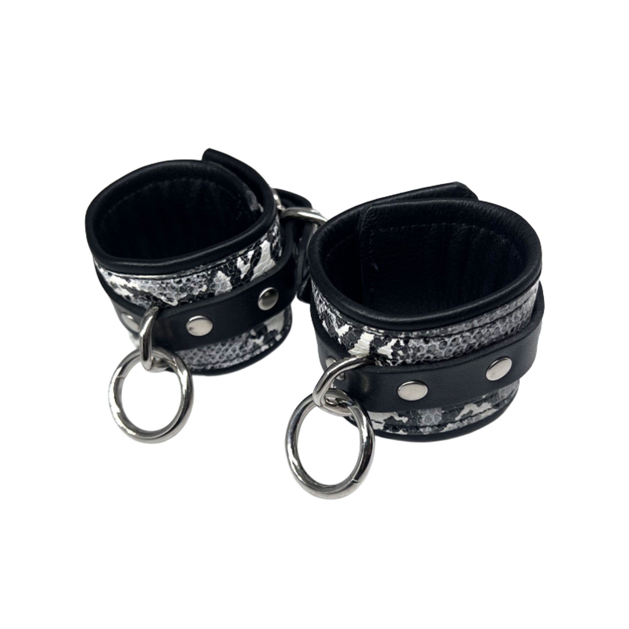 Leather exotic-leather cowhide crocodile croc snake metallic-chrome grommets accessories wrist-cuffs wristcuffs O-ring adjustable buckle D-ring reinforced-eyelets bold adventurous fetish fashion alt-fashion bedroom bondage bdsm bdsm-gear bdsm-toys restraints wrist-restraints sub submissive submission kink kinky kinky-toys kinky-play adult-toys unisex white black