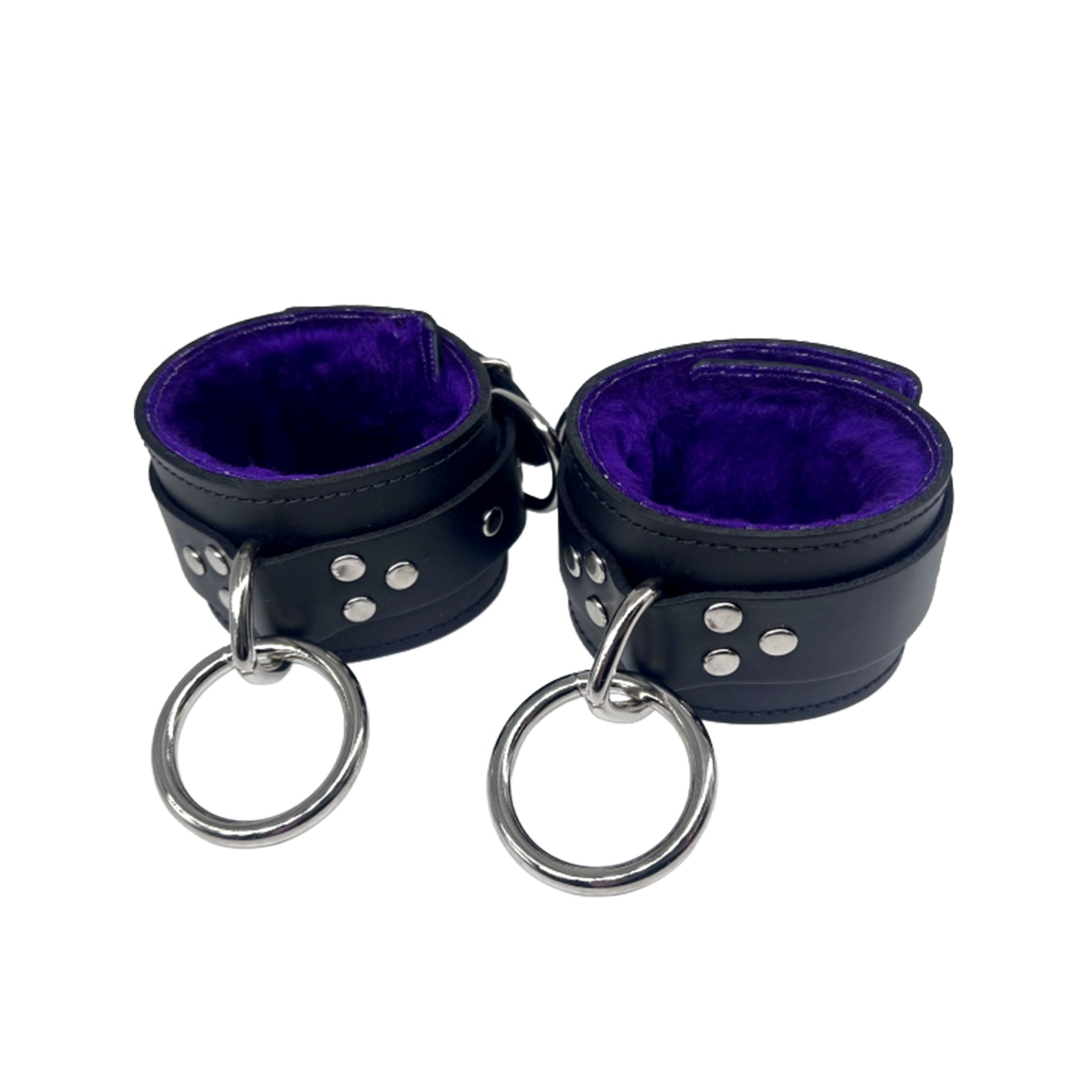 Leather latigo-leather genuine-leather fleece cotton-fleece accessories restraints cuffs wrist wristcuffs dual-layered fleece-lining fur-lining adjustable buckle jingle D-ring O-ring reinforced triple-reinforced durable soft luxury jingling fetish fashion alt-fashion bondage bdsm bdsm-fashion bdsm-gear restraints kink kinky kinky-gear kinkwear kinky-play adult-toys unisex black purple