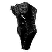 PVC vinyl polyester PU faux-leather patent-leather apparel tops one-piece onesie bodysuit sleeveless strapless cleavage roses big-roses studs studded dome-studs zipper back-zip hidden-zip half-zip high-leg snap-crotch snap-button shiny glossy unique edgy fetish fashion alt-fashion alternative punk goth gothic goth-doll rock pop-star costume cosplay halloween halloween-costumes female femme feminine womens black