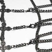 Aluminum-alloy iron chains metallic-chain apparel accessories skirt mini-skirt harness body-harness waist-harness cage-skirt hollow-cage tassels carved-crosses cross-chain adjustable closure lobster-clasp versatile textured comfortable subversive fierce slim-fit secure flexible stylish sleek edgy movement flair fetish fashion alt-fashion alternative punk rock goth gothic festival renfaire renaissance vintage costume cosplay halloween afterdark-collection female femme feminine womens black