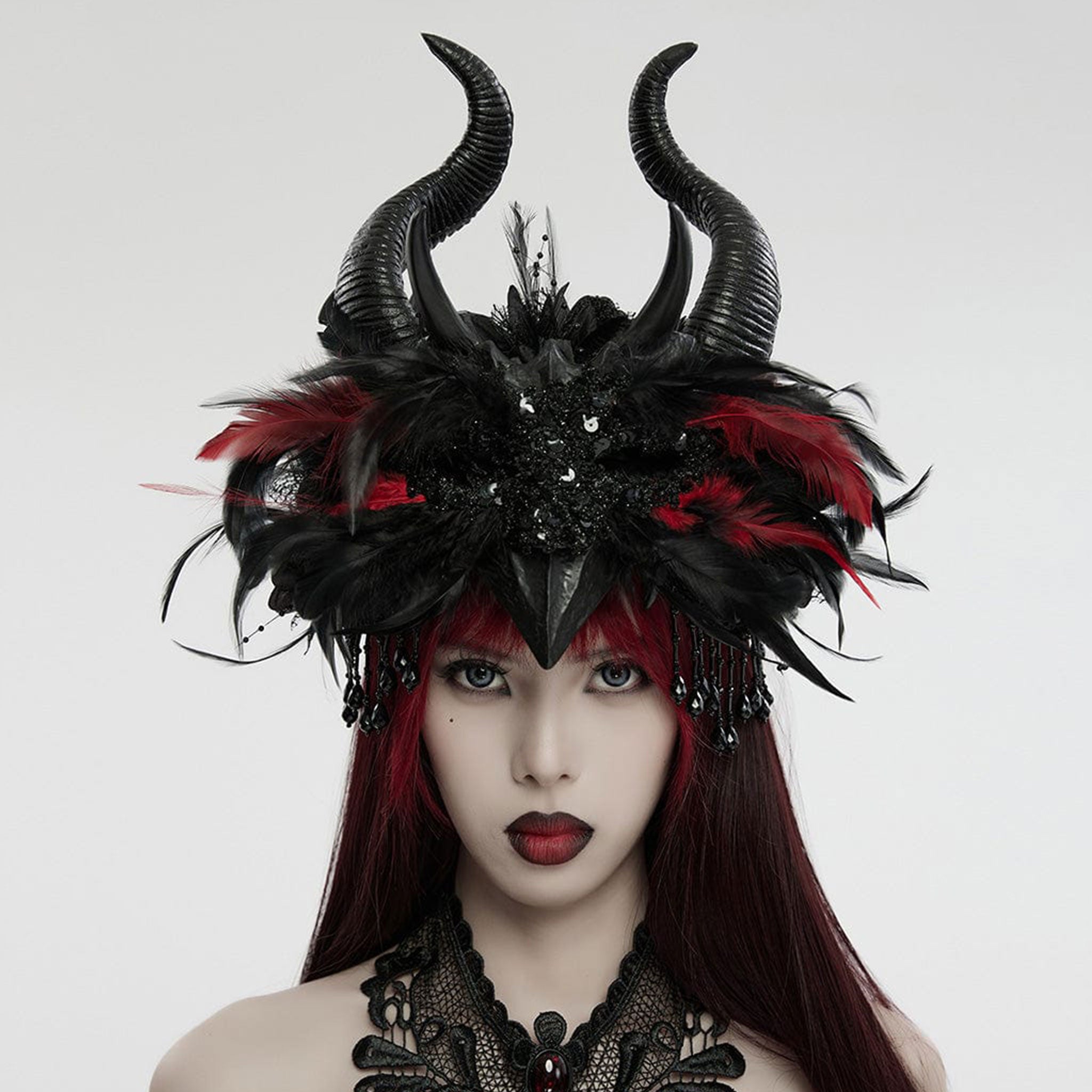 Rubber headgear headwear horns curved curves devil devilish demon demonic fey fay fairy antlers feather feathered sequined sequins sequin bead beads beaded chains costume accessories goth gothic halloween black red 