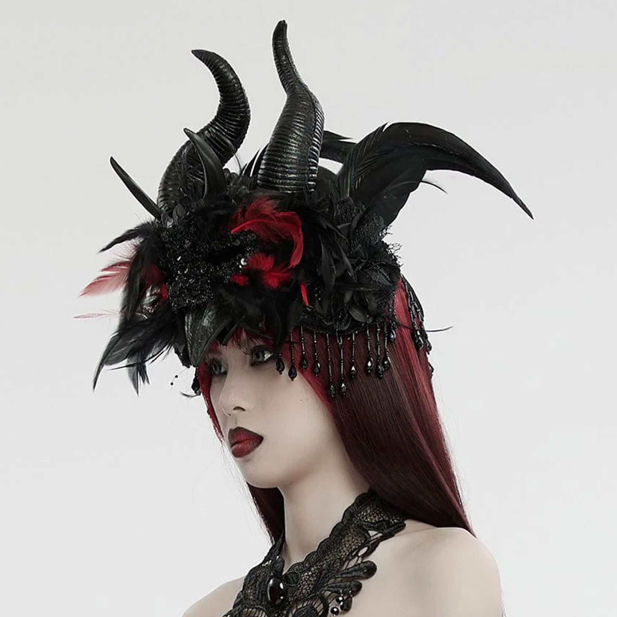 Rubber headgear headwear horns curved curves devil devilish demon demonic fey fay fairy antlers feather feathered sequined sequins sequin bead beads beaded chains costume accessories goth gothic halloween black red 