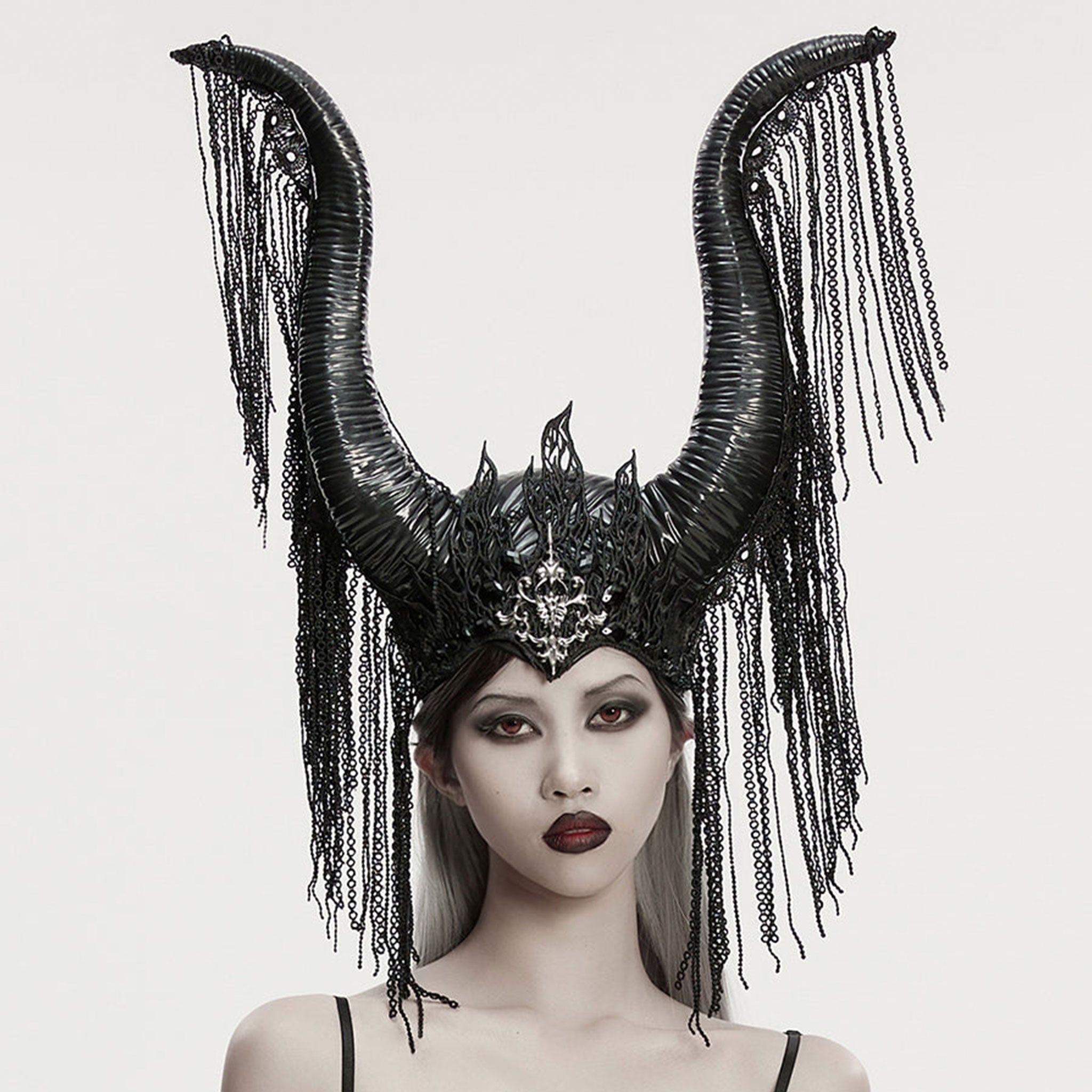 Polyester metallic-alloy rubber molded-rubber styrofoam headgear head-gear horned horns long-horns big-horns crown lace lace-chain chain-lace flame-lace ornate ornamental lace-fringe chain-fringe lightweight cascading dramatic exquisite intricate elastic flexible close-fitting alt-fashion goth gothic sinister dark fantasy regal striking costume cosplay halloween queen demon-queen dark-queen sorceress sorcerer cursed witch monarch empress emperor vampire female femme feminine womens black