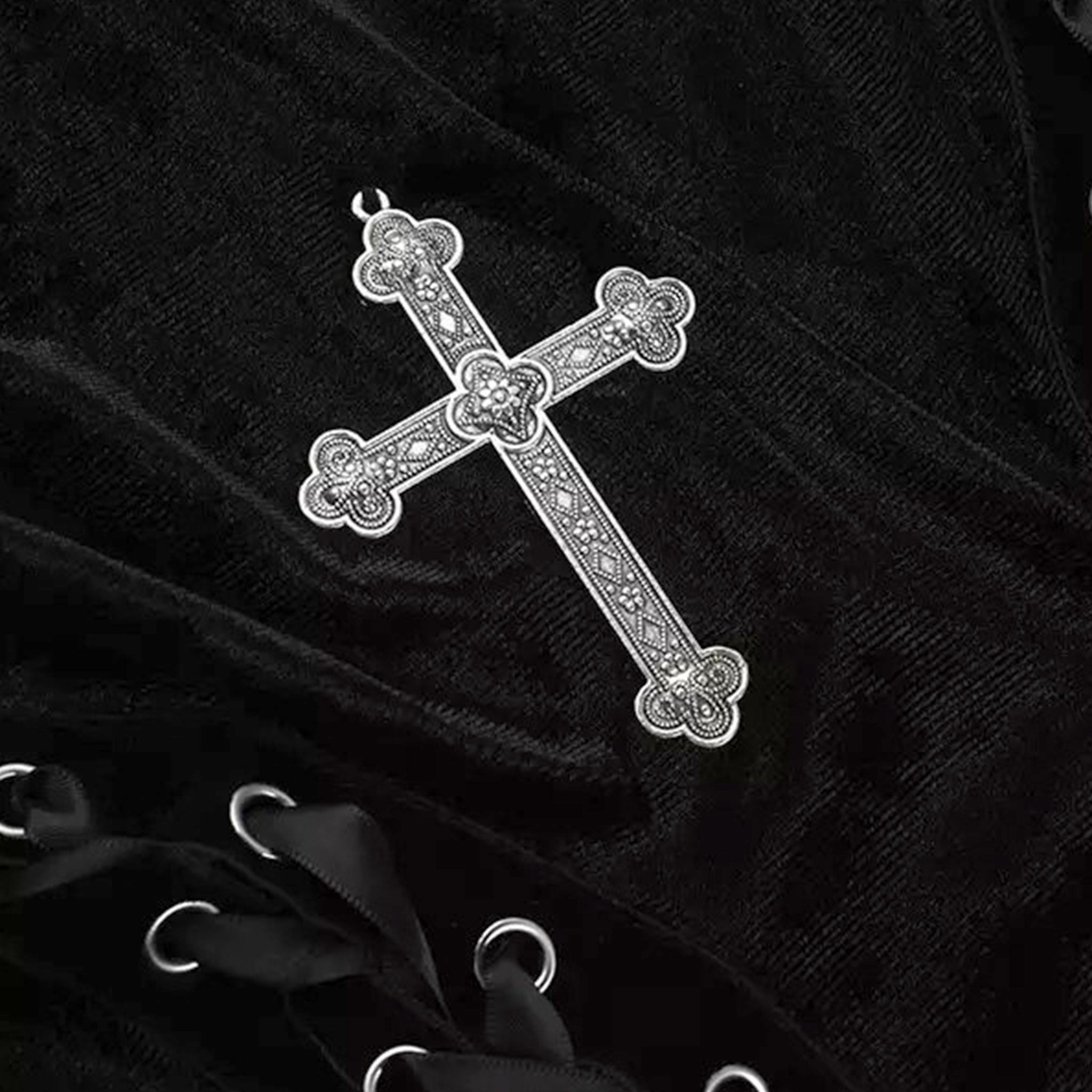 Polyester elastane velvet velvet-knit satin-ribbon apparel dress midi-dress sleeveless high-slit front-slit cross trilobe-cross irregular-hem tie-straps adjustable shoulder-straps side-cinching strappy shiny shimmery stylish figure-hugging alluring sexy slim-fit comfortable durable fashion alt-fashion alternative metal rock goth gothic goth-doll streetwear summer dark costume cosplay halloween halloween-costumes witch vampire ravencross female femme feminine womens black