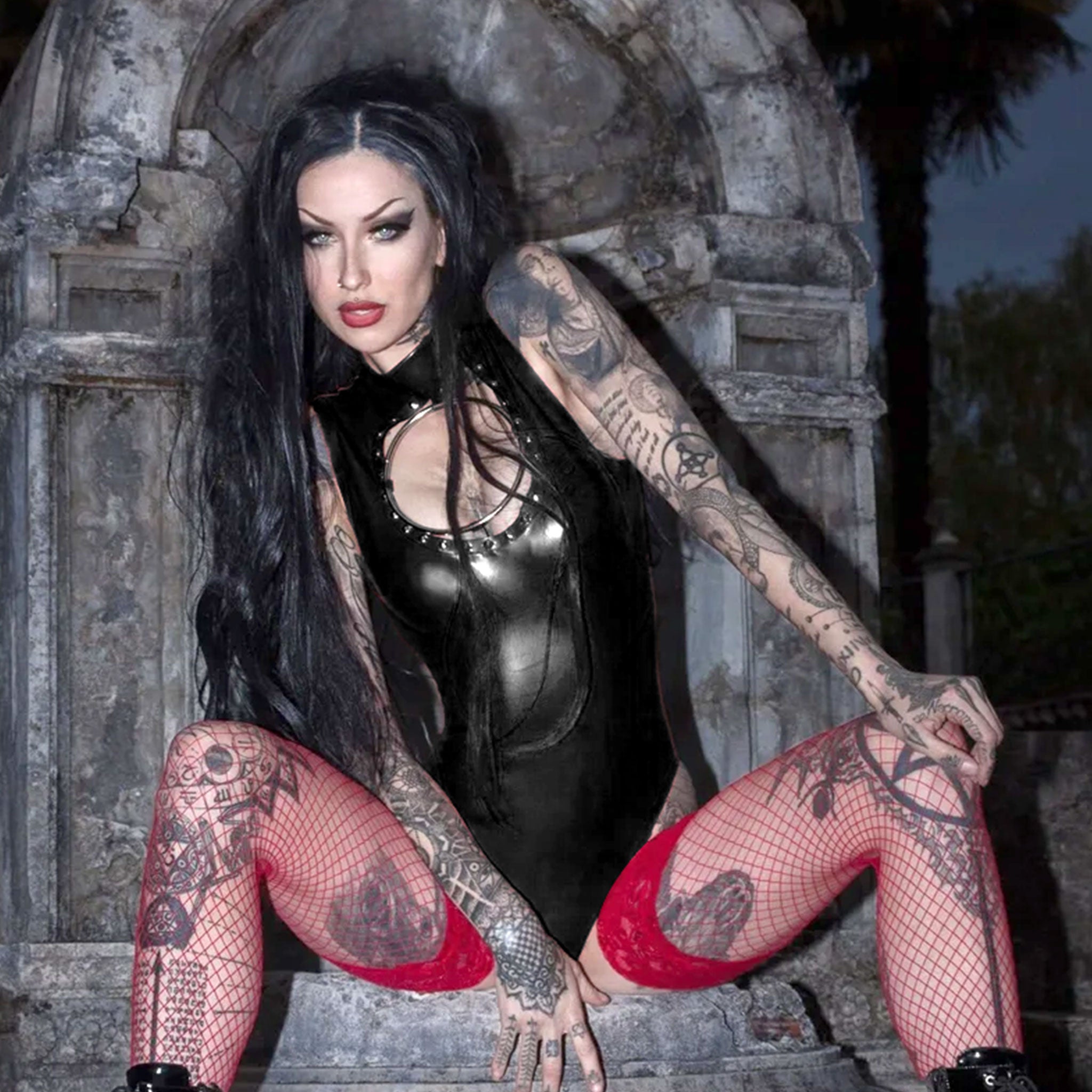 Latex rubber stainless-steel apparel intimates lingerie bodysuit body-suit sleeveless studs studded oversized O-ring chest-window keyhole-cutout zipper back-zip high-cut beautiful power presence shiny glossy fetish fashion alt-fashion alternative bedroom dungeon clubwear dancewear bondage bdsm bdsm-fashion dom dominant dominatrix dominatrix-fashion costume cosplay halloween female femme feminine womens black