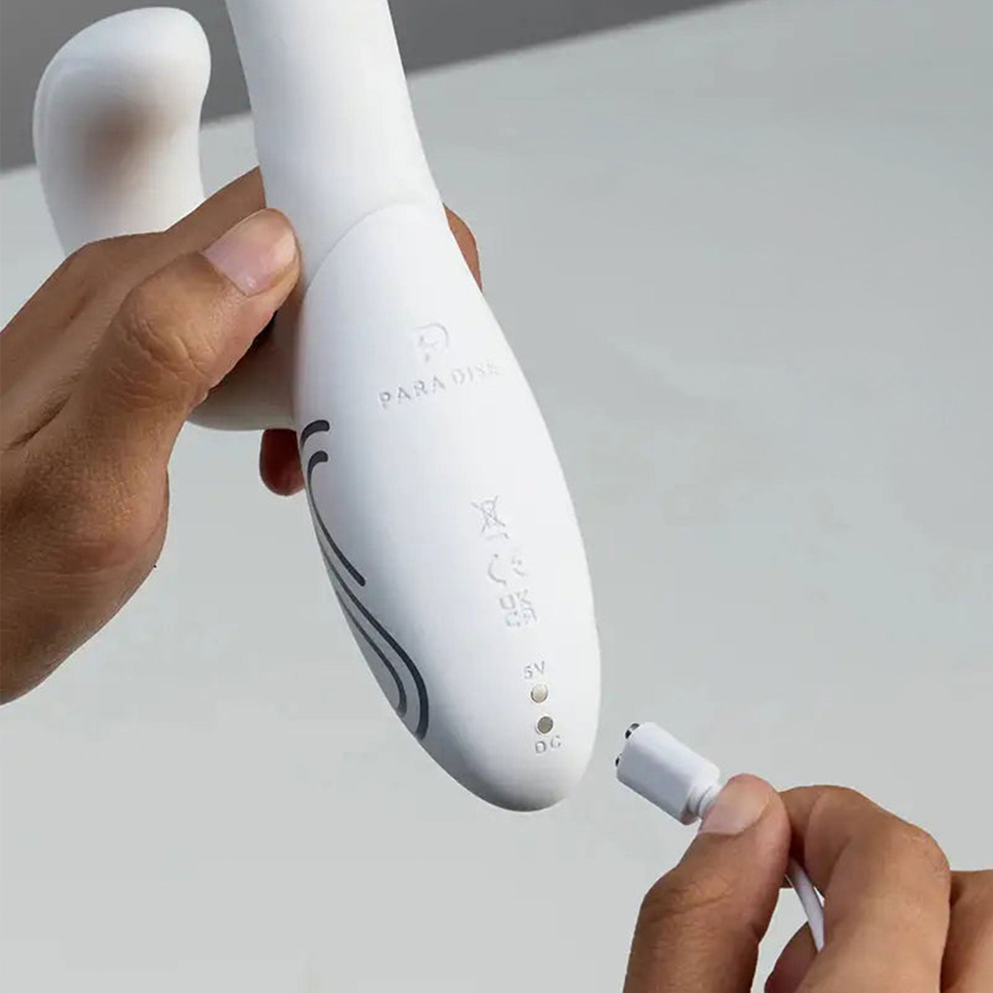 Silicone premium accessories rabbit vibe vibrator vibrating vibration stim stimulator stimulation stimulating g-spot p-spot firm smooth curved-shaft curved light-up led-lights glow-in-the-dark glowing flexible-arm flexible app-enabled app-controlled app-compatible usb-rechargeable waterproof bath-play shower-play intuitive vibrant female femme feminine womens adult-toys white