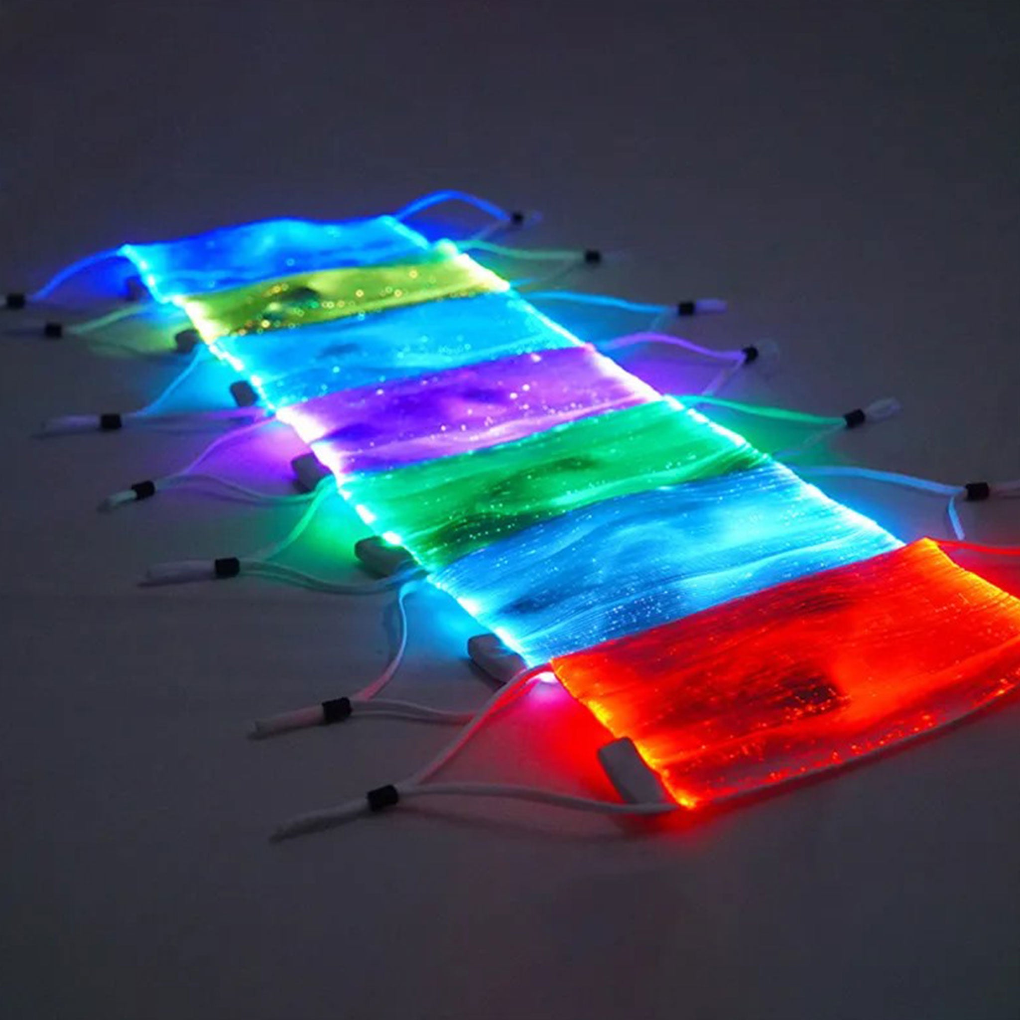 Optical-fiber polyester cotton accessories mask face-mask fabric-mask surgical-mask air-pollution PM2.5 filter LED LED-lights fiberoptic fiber-optic light-up lightup glow-in-the-dark USB-rechargeable adjustable earloops ear-loops luminous fetish fashion alt-fashion cyber cyberpunk cyber-punk punk party rave ravewear festival bondage bdsm bdsm-toys kink kinky kinky-play costume cosplay halloween masquerade unisex white