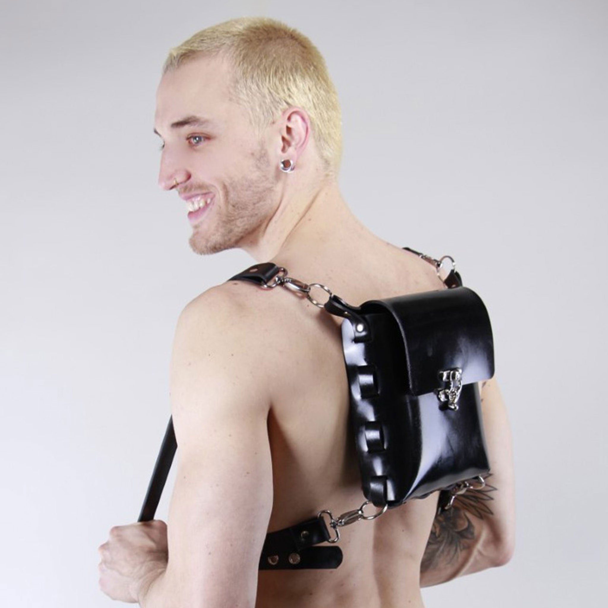 Latex rubber accessories luggage bag backpack pouch compact spacious shoulder-straps adjustable detachable bold shiny glossy fetish-inspired 
fetish fashion alt-fashion black