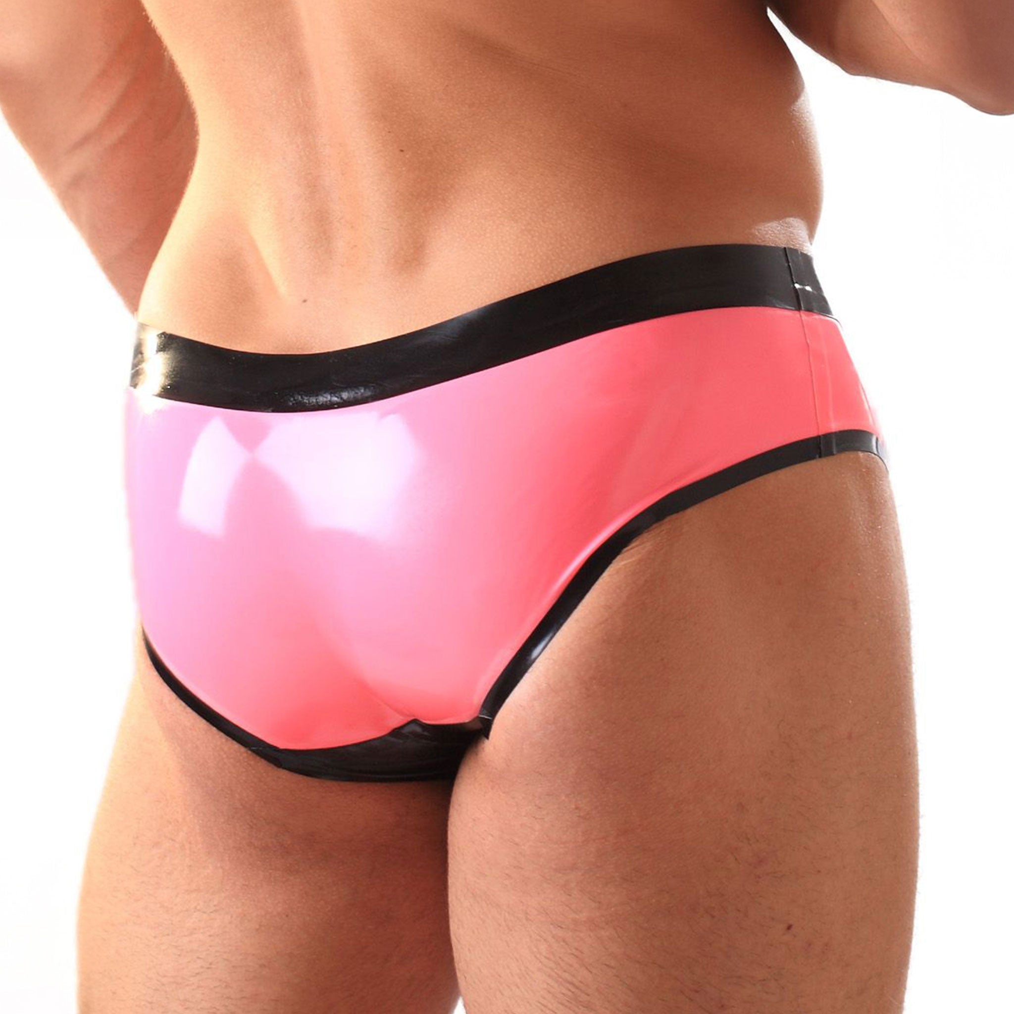 Latex rubber apparel intimates bottoms lingerie underwear briefs low-rise shaped-pouch crotch pouch stretchy shiny glossy striking vibrant fetish fashion alt-fashion alternative hipster ravewear kink kinky kinkwear costume cosplay halloween male masculine masc mens guys dudes gay queer lgbtq black pink