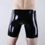 Latex hand-cut glued-latex glued bottoms shorts cycle-shorts sport-shorts ultimate-shorts mid-thigh mid-length curved-pouch second-skin fetish-shorts athletic-shorts long-shorts rubber-shorts crotch-pouch skinny-leg high-shine shiny smooth sleek tight sexy male masculine masc mens guys dudes black