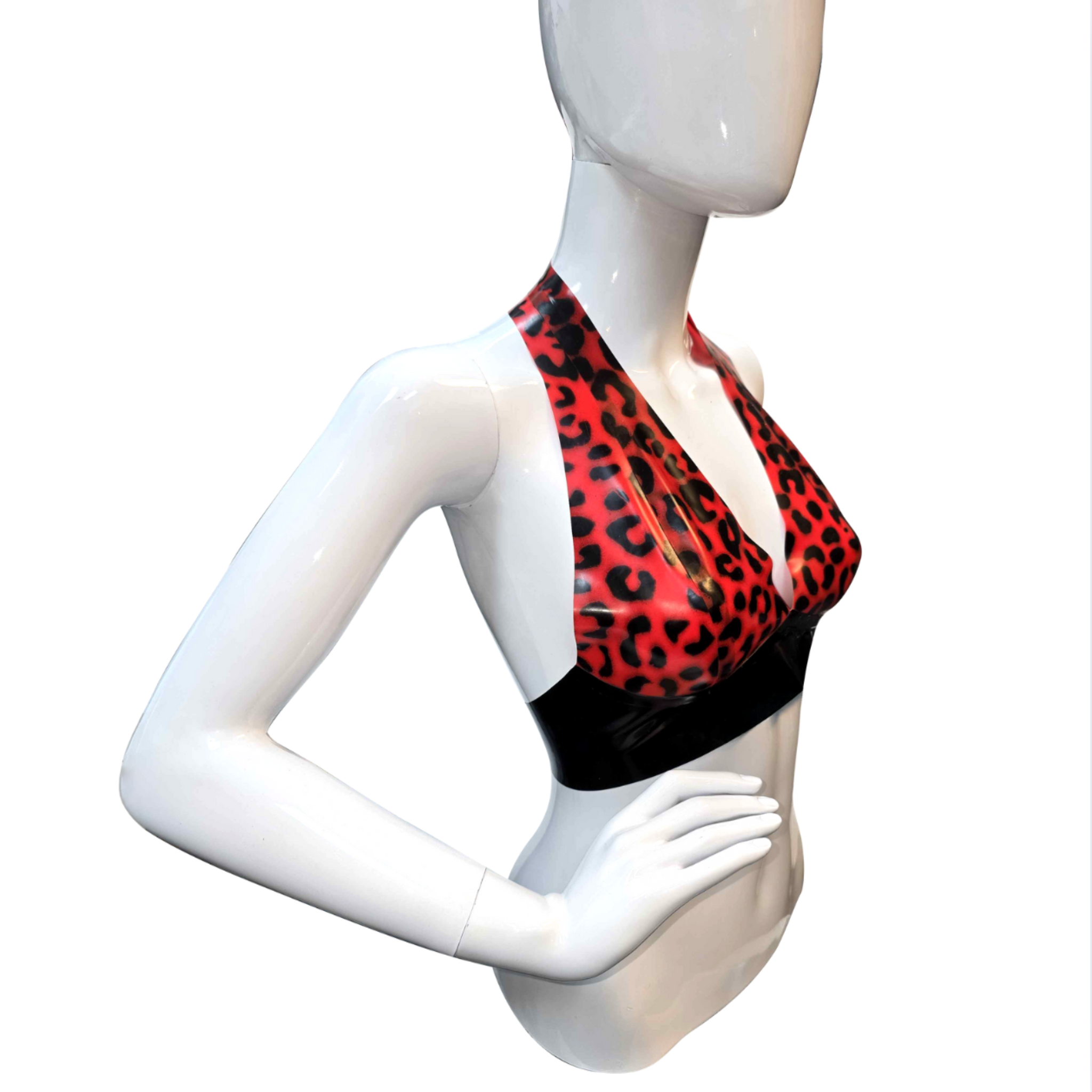 Latex leopard halter bra handmade in NYC, glossy natural latex lingerie with halter neckline and bold leopard print design, fetish fashion bra for daring alternative style and confident statement wear
