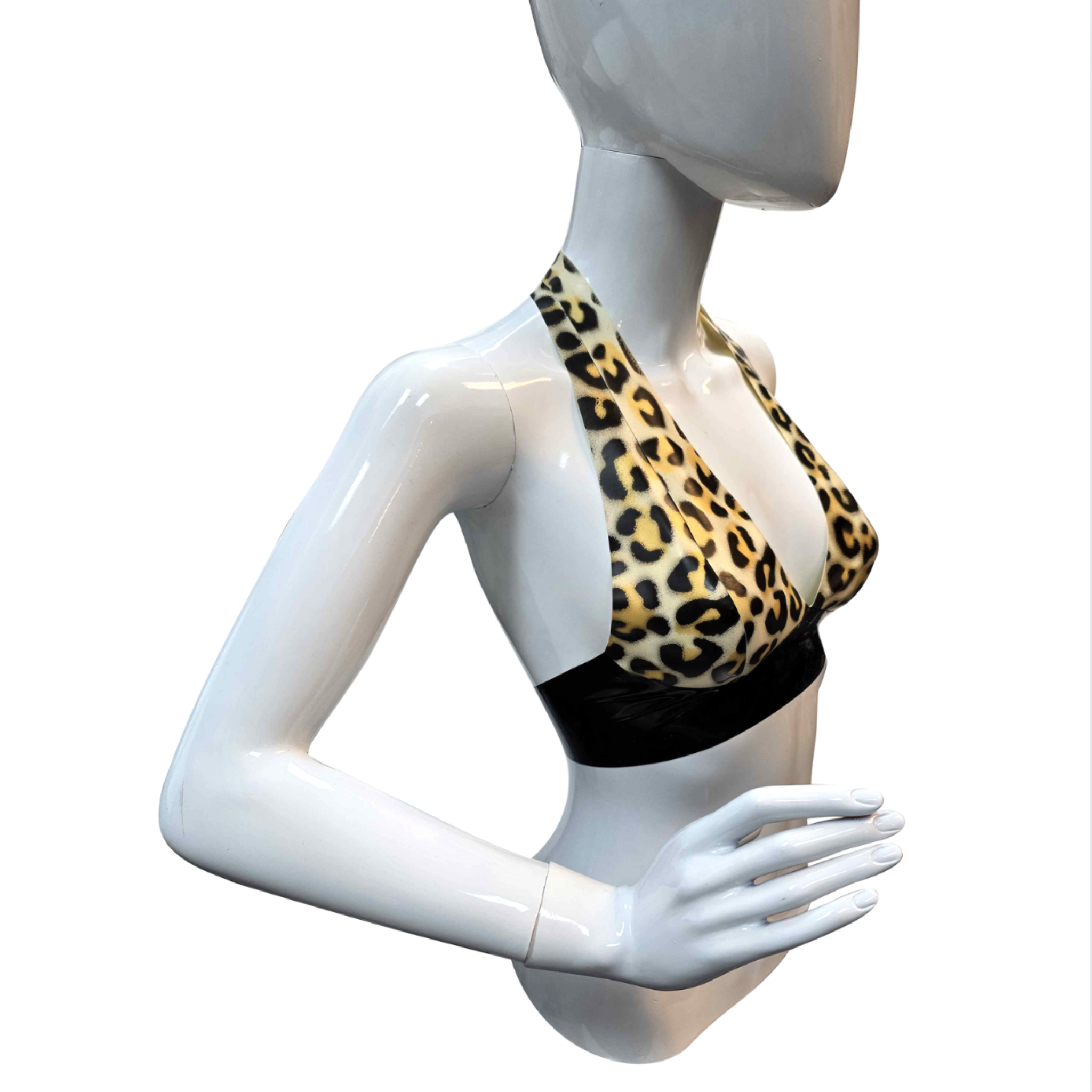 Latex leopard halter bra handmade in NYC, glossy natural latex lingerie with halter neckline and bold leopard print design, fetish fashion bra for daring alternative style and confident statement wear
