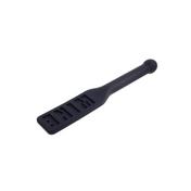 MINE Carved Silicone Paddle with flexible head and metal-reinforced handle for lasting impression.