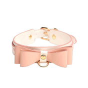Leather vegan-leather nickel-free accessories collar choker double-bow adjustable buckle D-ring gold-plated fetish fashion alt-fashion bondage bdsm bdsm-gear bdsm-toys sub submission submissive dom domination domme dominatrix kink kinky kinky-toys kinkwear pet-play pet pet-training animal animal-print kitty kitten cat feline costume cosplay halloween unisex pink white