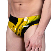 Latex rubber apparel bottoms intimates underwear lingerie briefs brief brief-cut full-cut durable comfortable fetish fashion alt-fashion alternative punk cyber festivalwear rave ravewear bedroom dungeon bondage bdsm bdsm-fashion kink kinky kinkwear costume cosplay halloween male masculine masc mens menswear guys dudes marbled-pattern yellow