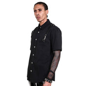 Bengaline polyester Spandex PU-leather leather apparel tops shirt shortsleeve short-sleeve sleeves sleeved collared shoulder-straps Y-shaped breast-pocket button-u button-placket snap-button press-stud D-ring fetish fashion alt-fashion retro-fashion punk rock greaser goth gothic cyber cyberpunk cyber-punk casual everyday party male masculine masc mens menswear guys dudes black