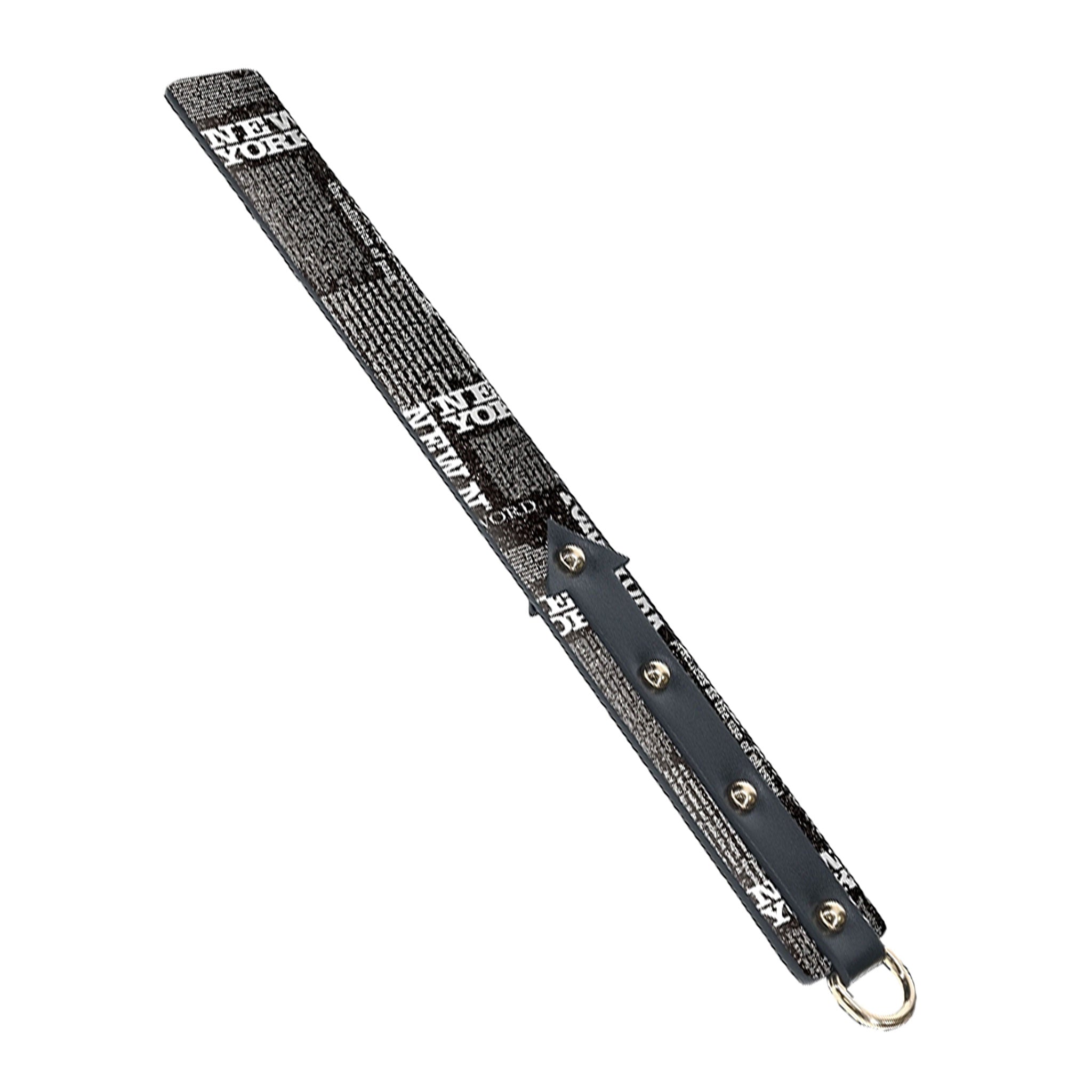 Leather bonded PU PVC tough paddle spanking impact impact-play impact-toys bdsm sadism masochism sadomasochism new-york ny nyc accessories black glitter newspaper