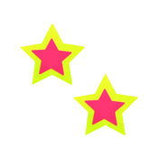 Swimsuit-material adhesive accessories intimates pasties nipple-pasties nipple-covers breast-petals breast-shields star star-shaped two-tone sexy blacklight-reactive uv-glow fashion alt-fashion alternative bedroom dungeon festival rave raver-babe kink kinky kinkwear costume cosplay halloween halloween-accessories double-starburst starry-night gifts female femme feminine womens yellow-pink