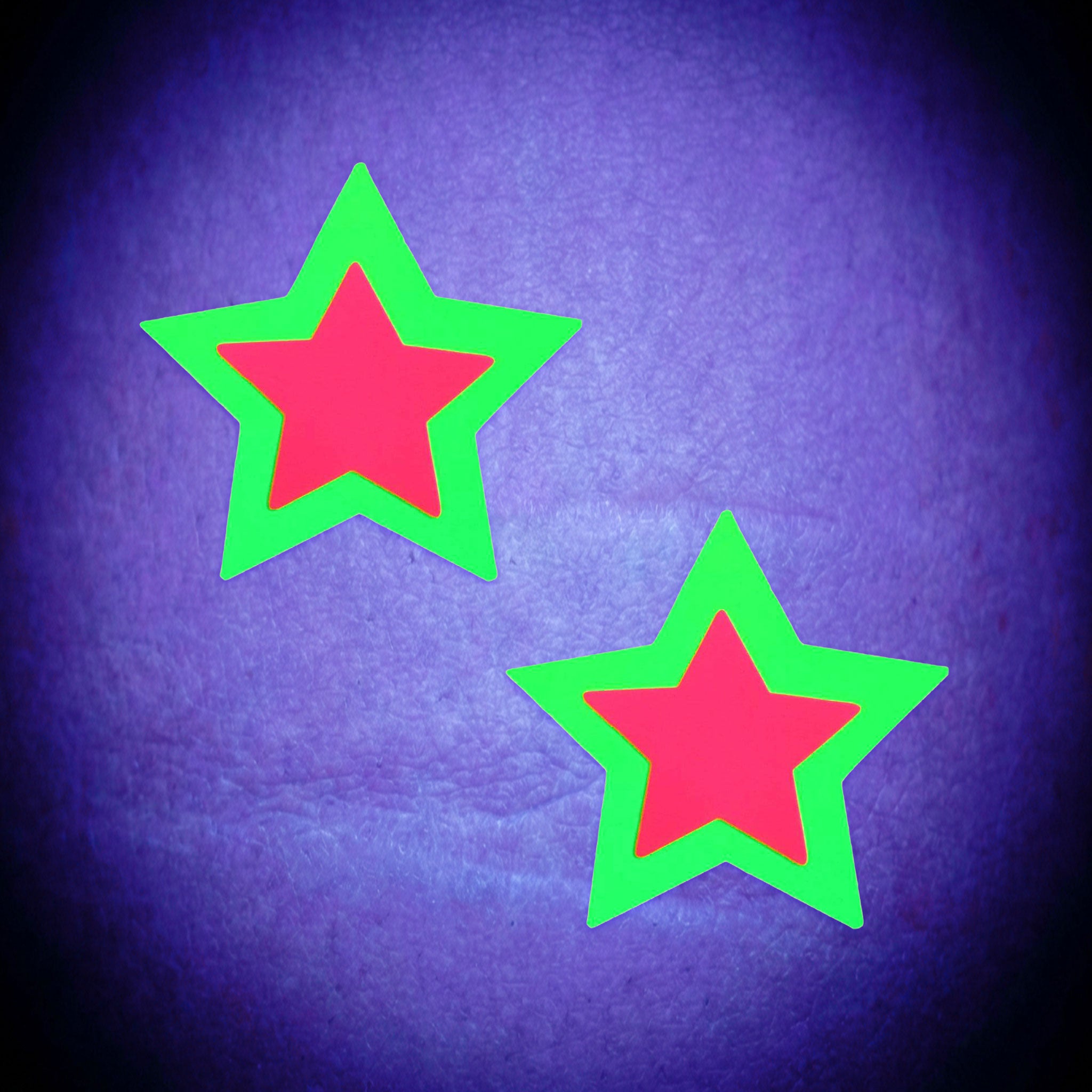 Swimsuit-material adhesive accessories intimates pasties nipple-pasties nipple-covers breast-petals breast-shields star star-shaped two-tone sexy blacklight-reactive uv-glow fashion alt-fashion alternative bedroom dungeon festival rave raver-babe kink kinky kinkwear costume cosplay halloween halloween-accessories double-starburst starry-night gifts female femme feminine womens yellow-pink
