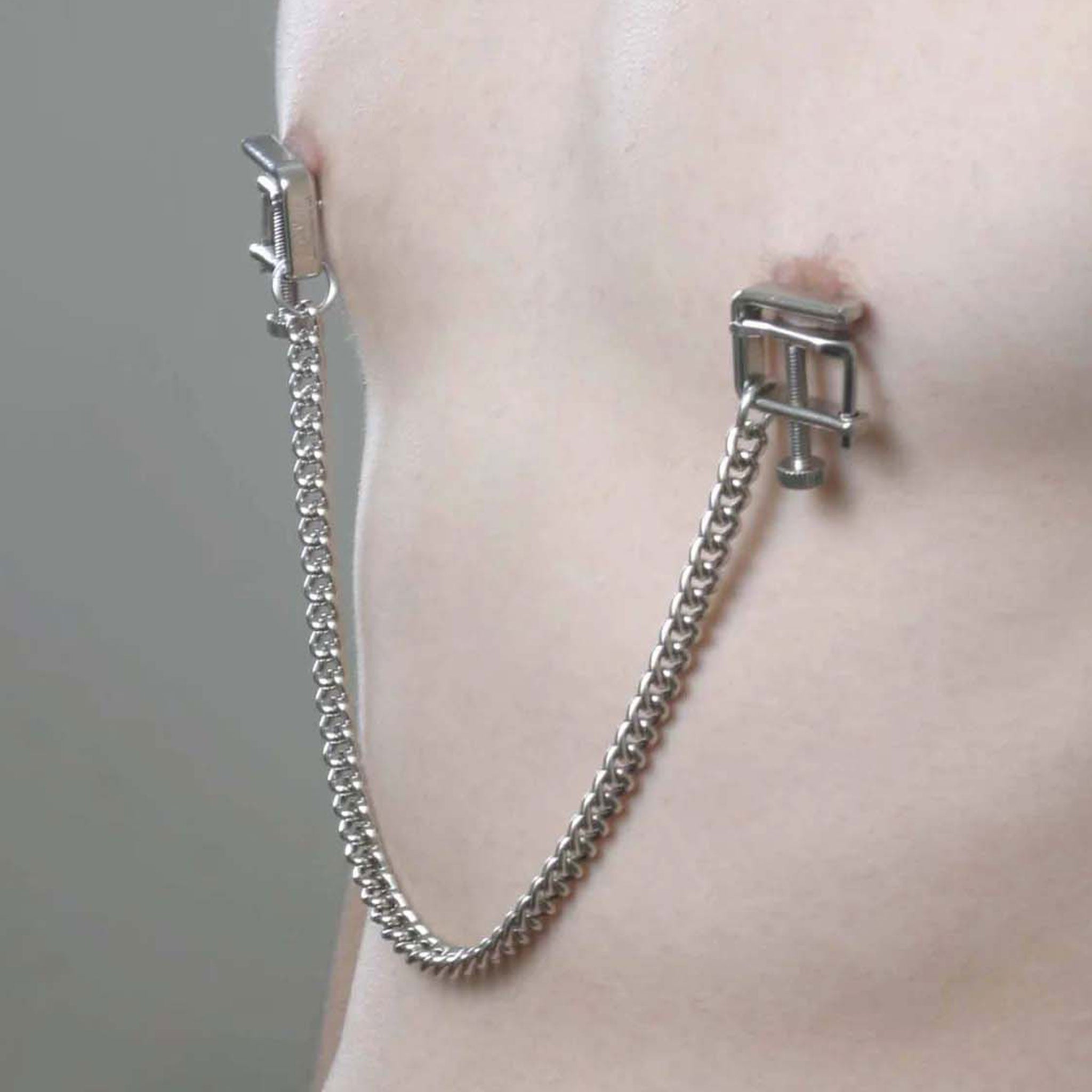 Stainless-steel metallic-chain accessories clamps nipple-clamps C-clamp open-press nipple nipple-play thumbscrew thumb-screw fine-threaded adjustable connecting-chain removable teasing precise durable smooth customizable fetish fashion alt-fashion bedroom dungeon bondage bdsm bdsm-toys restraints kink kinky kinky-toys kinky-play sensory-play pinching pressure pain punishment stocking-stuffers gifts adult-toys unisex silver