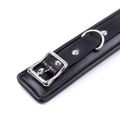 Leather faux-leather accessories neck restraint choker collar padded-collar padded lead leash chain-leash dual-layer tracking-chain D-ring detachable adjustable locking lockable locking-buckle spring-clasp soft matte-finish sleek fetish fashion alt-fashion alternative bedroom dungeon goth gothic cyber festivalwear bondage bdsm bdsm-gear bdsm-toys sub submissive submission submission-play kink kinky kinky-play kinky-toys kinkwear pet pet-play control roleplay role-play adult-toys unisex black