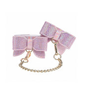 Leather bonded PU PVC iridescent cuffs ankle anklecuffs ankle-cuffs bow rhinestone D-ring chain metallic linking adjustable sturdy durable bdsm bdsm-gear bondage restraints kink kinky kinky-play accessories cute paris pink