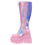 Leather vegan-leather accessories footwear boot platform-boot chunky-platform lace-up knee-high knee-hi rounded-toe zipper side-zip inside-zip embroidered-logo textured-outsole lightweight cute fetish fashion alt-fashion rave ravewear raver-babe clubwear cyber cyberpunk cybergoth festival costume cosplay halloween fairy fairy-kiss female femme feminine womens pink iridescent iridescent-snakeskin