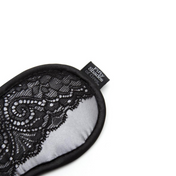 Satin and lace blindfold, silver with black lace detailing.