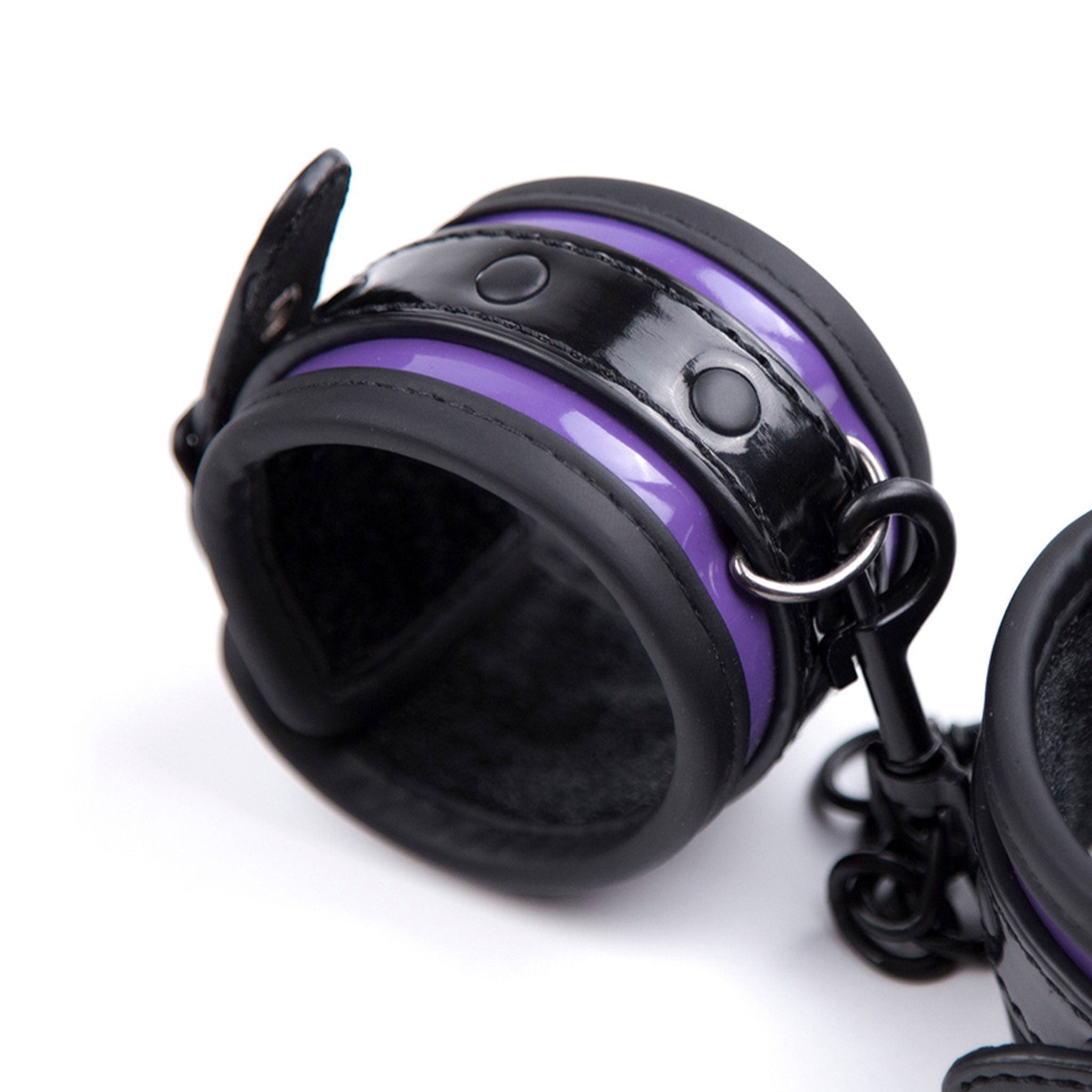 PVC vinyl velvet-lining leather patent-leather restraints cuffs wrist wrist-cuffs adjustable buckle removable-chain D-ring lobster-clasp soft comfortable durable fetish fashion alt-fashion bdsm bdsm-toys bondage kink kinky kinky-play unisex purple black