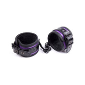 PVC vinyl velvet-lining leather patent-leather restraints cuffs wrist wrist-cuffs adjustable buckle removable-chain D-ring lobster-clasp soft comfortable durable fetish fashion alt-fashion bdsm bdsm-toys bondage kink kinky kinky-play unisex purple black